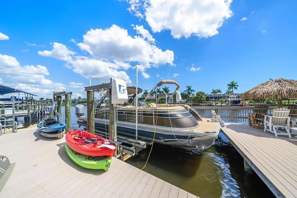Sunset Canal- Waterfront Heated Salt Pool Golf Holiday home