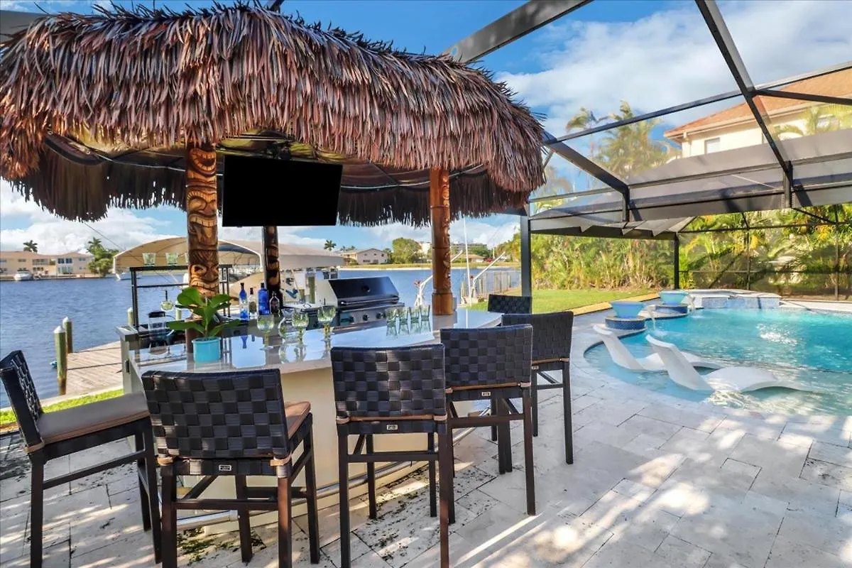 Holiday home Neptunes Villa-canalfront, Heated Pool, Outdoor Kitchen, Tiki Hut *