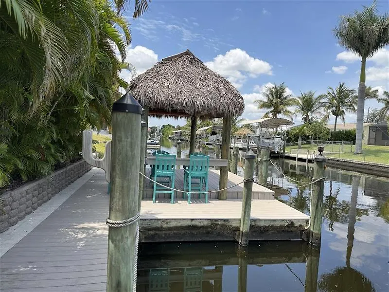 Heated Pool & Tiki Hut On A Stunning Canal View - The Dancing Dolphin - Roelens Cape Coral